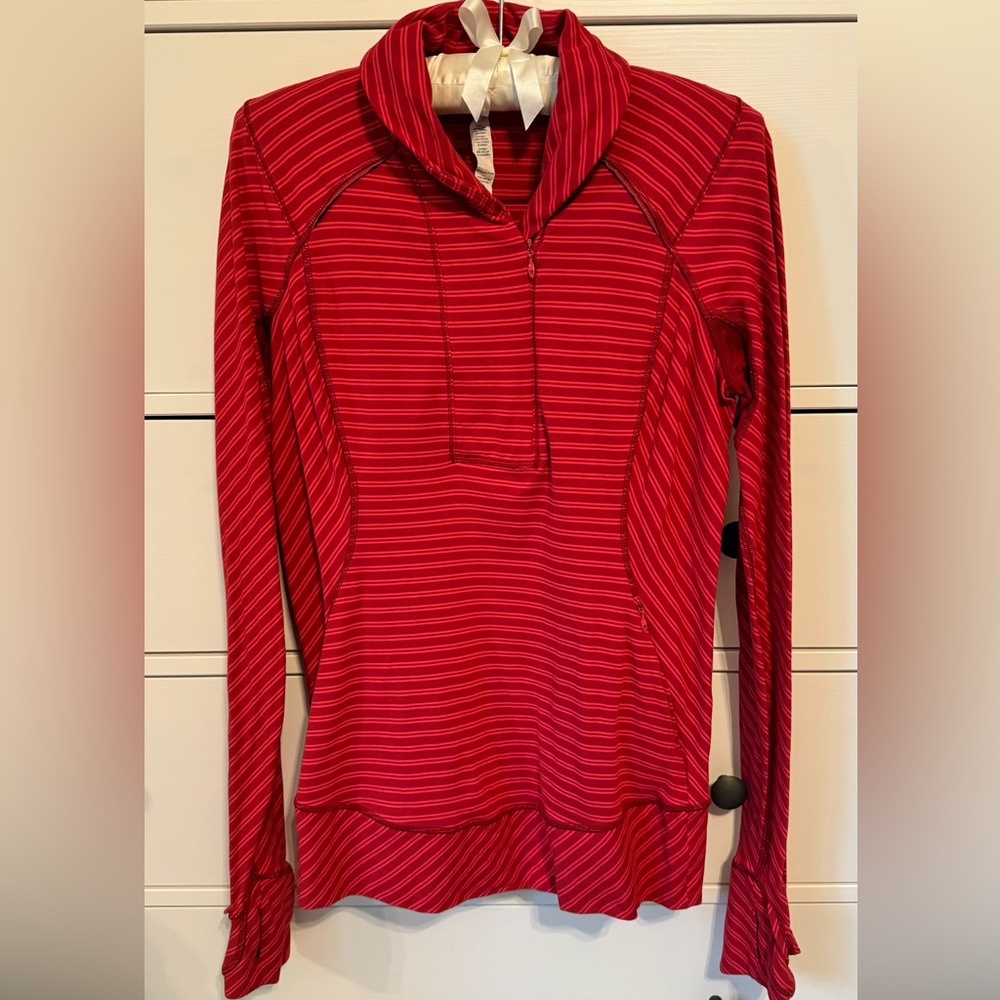 Lululemon long sleeved to, size 10. Barely worn.